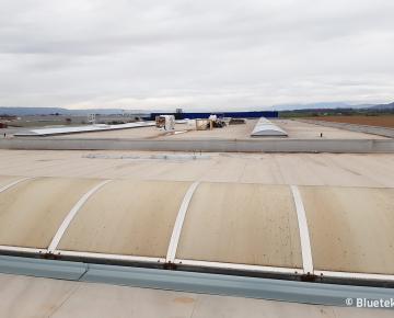 Rénovation lanterneaux filants par voûte Bluetek plateforme logistique