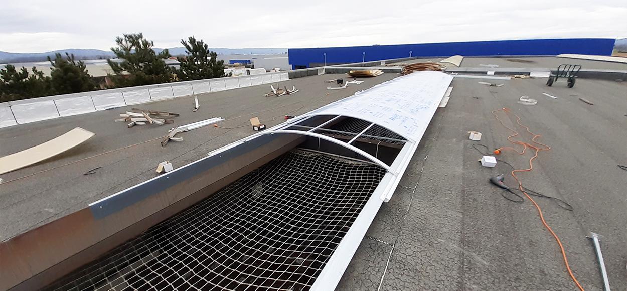 Rénovation lanterneaux filants par voûte Bluetek plateforme logistique