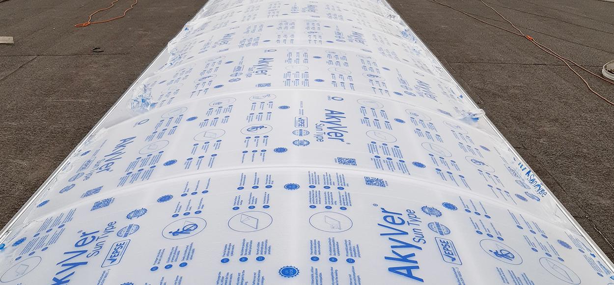 Rénovation lanterneaux filants par voûte Bluetek plateforme logistique